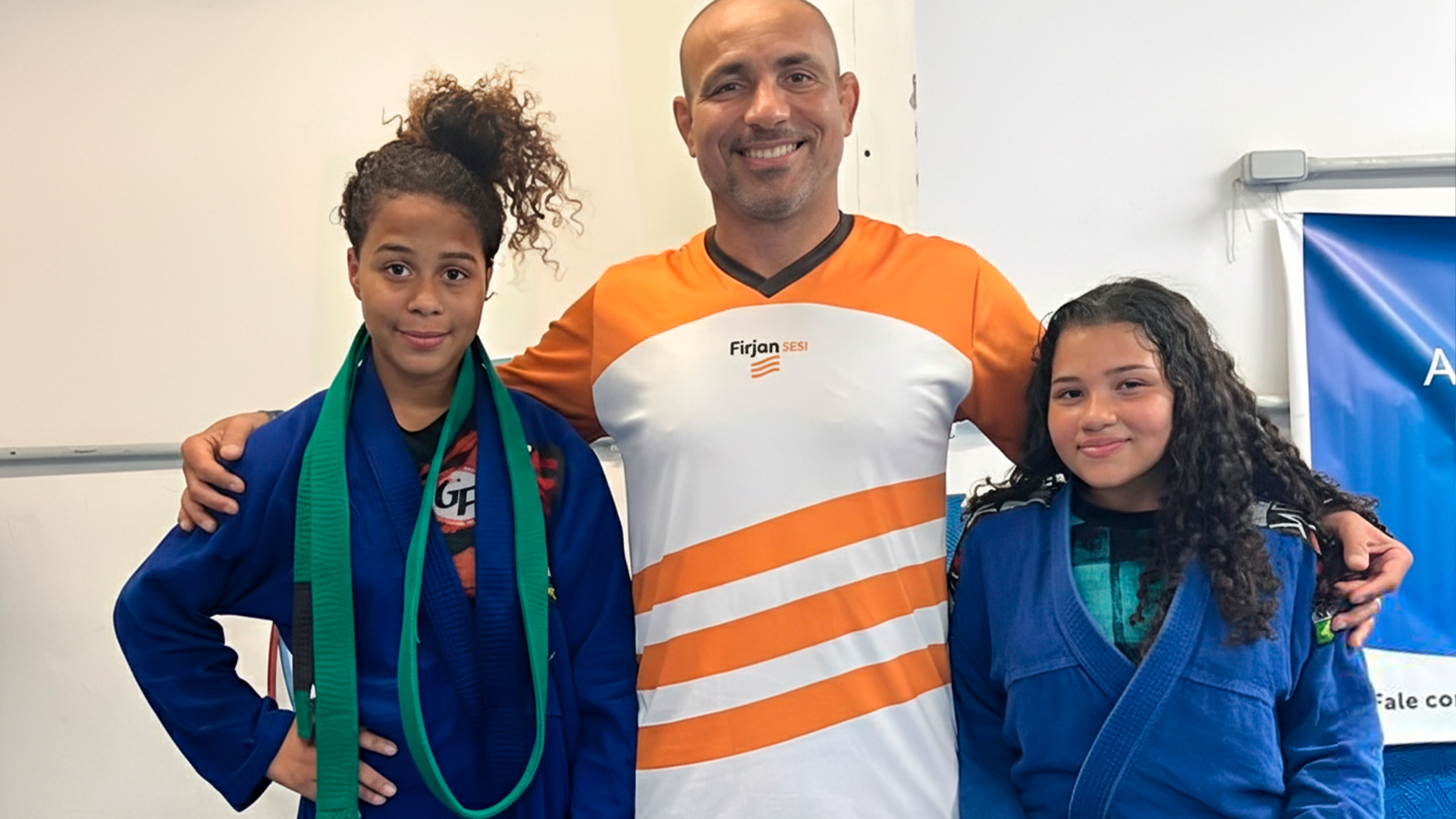 lutadoras e treinador